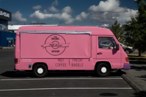 Custom Made Pink Vehicle Wrap for Business